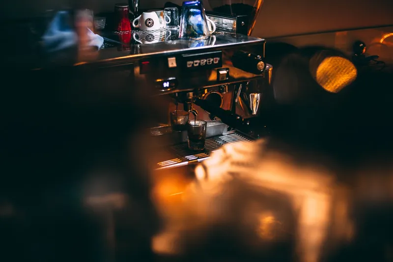 Warm light glowing over the espresso bar